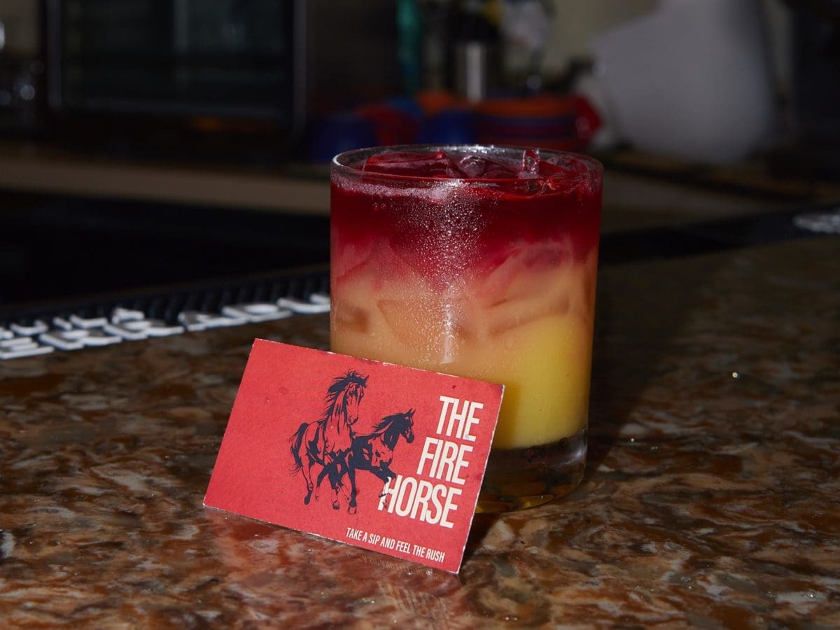 The Fire Horse cocktail and keepsake card at the Paniolo Bar